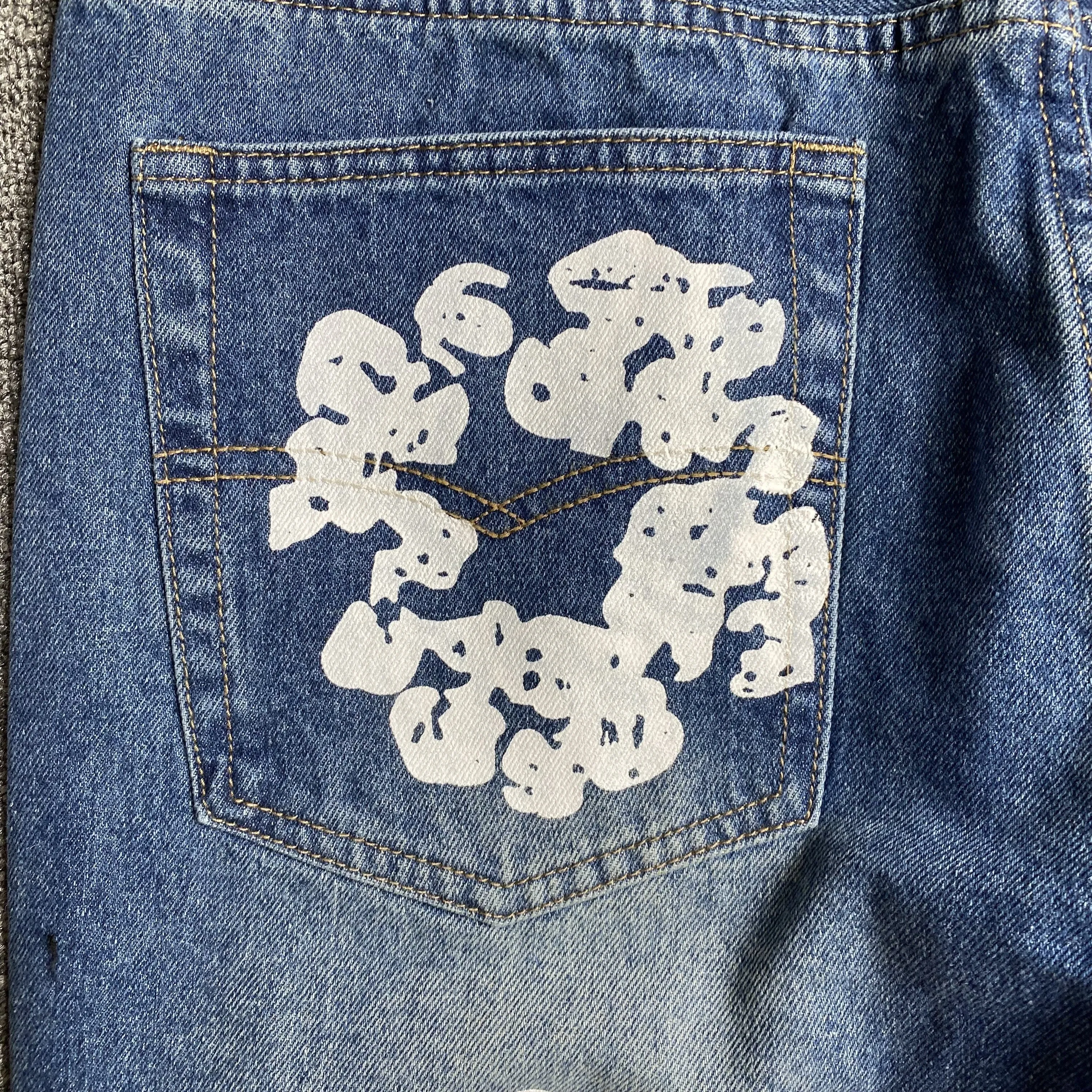 DENIM TEARS x LEVI'S COTTON WREATH JEANS BLUE