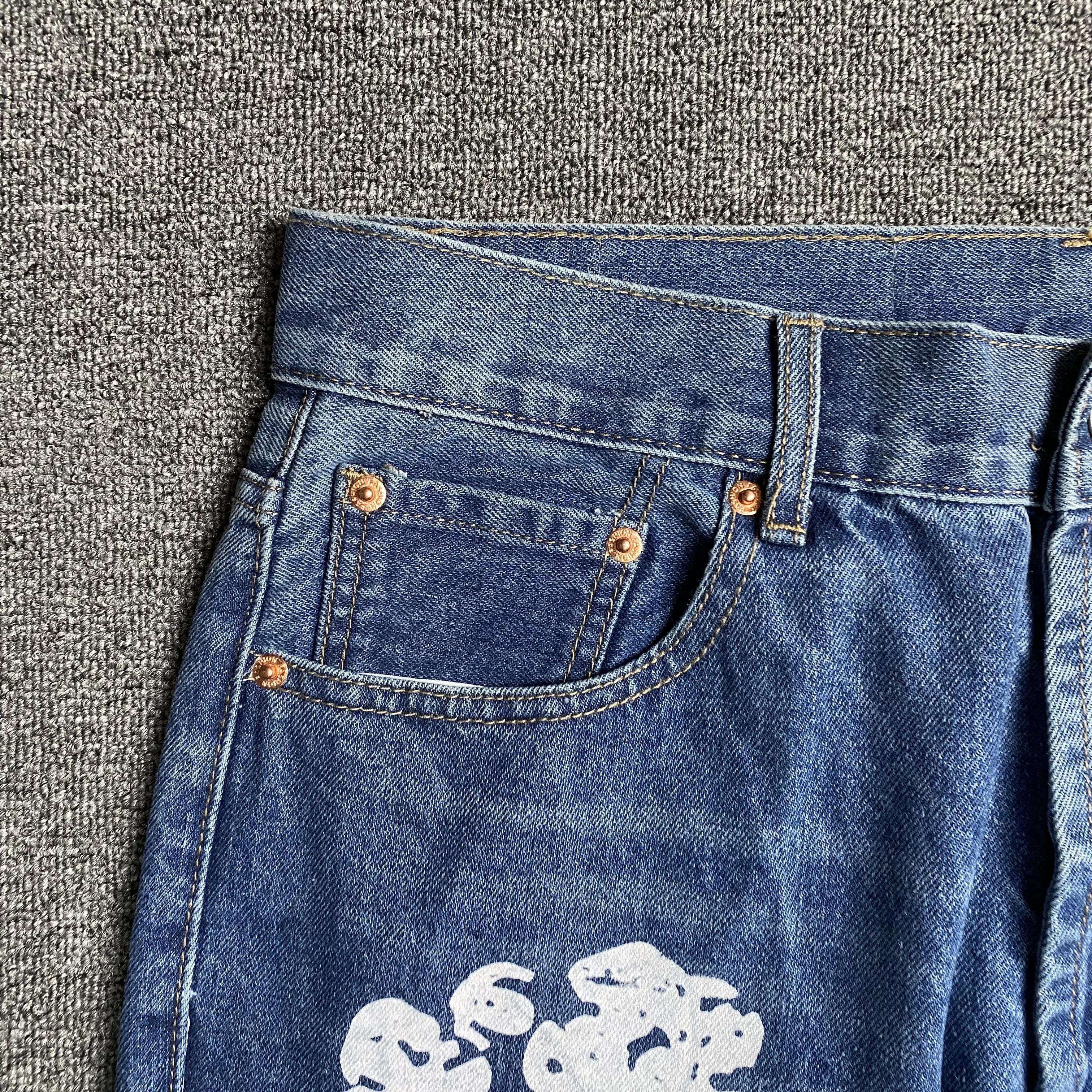 DENIM TEARS x LEVI'S COTTON WREATH JEANS BLUE